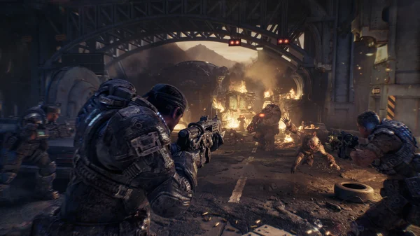 Official Gears of War: E-Day gameplay screenshot showing a squad taking cover behind wrecked vehicles while fighting Locust enemies, including a large armored Boomer